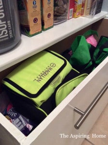 view of under shelf storage bins