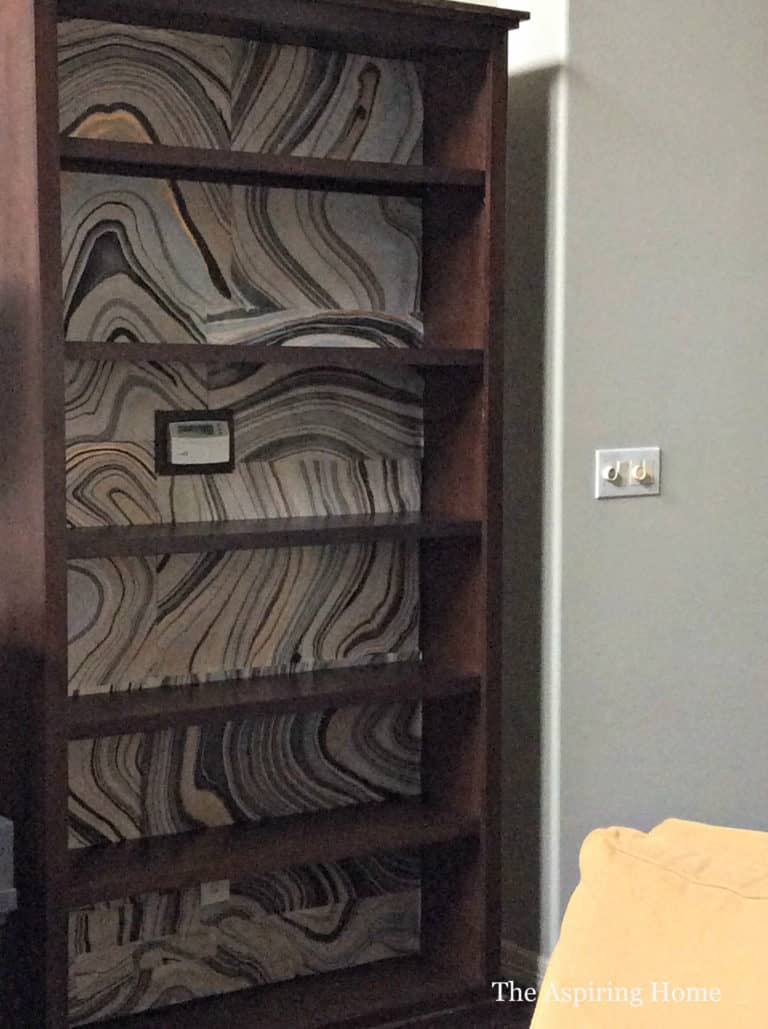 Bookcase Makeover Using Black Ink Marbled Paper