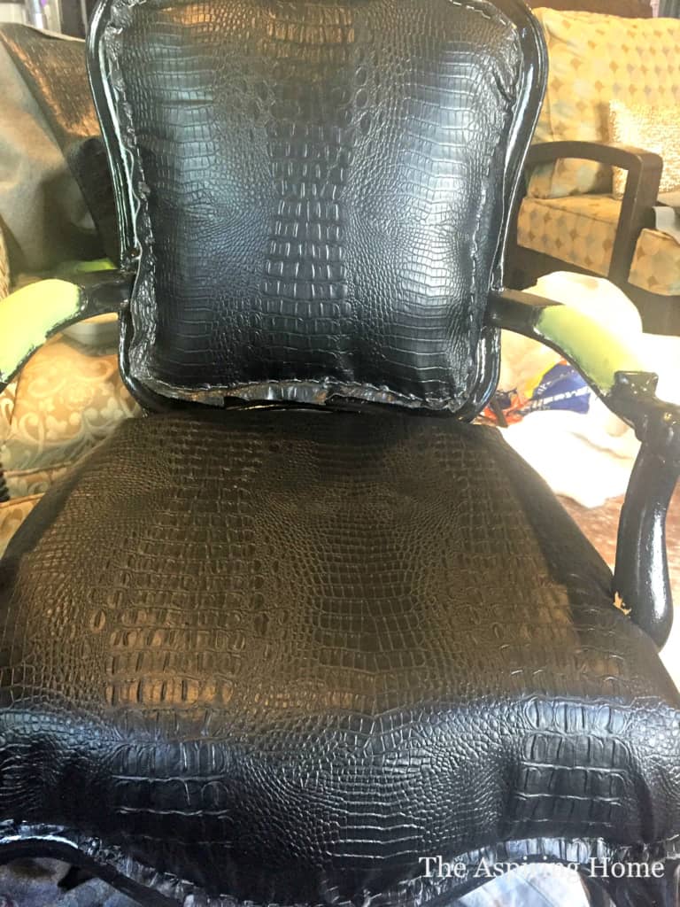 attach fabric with staples to reupholster a chair