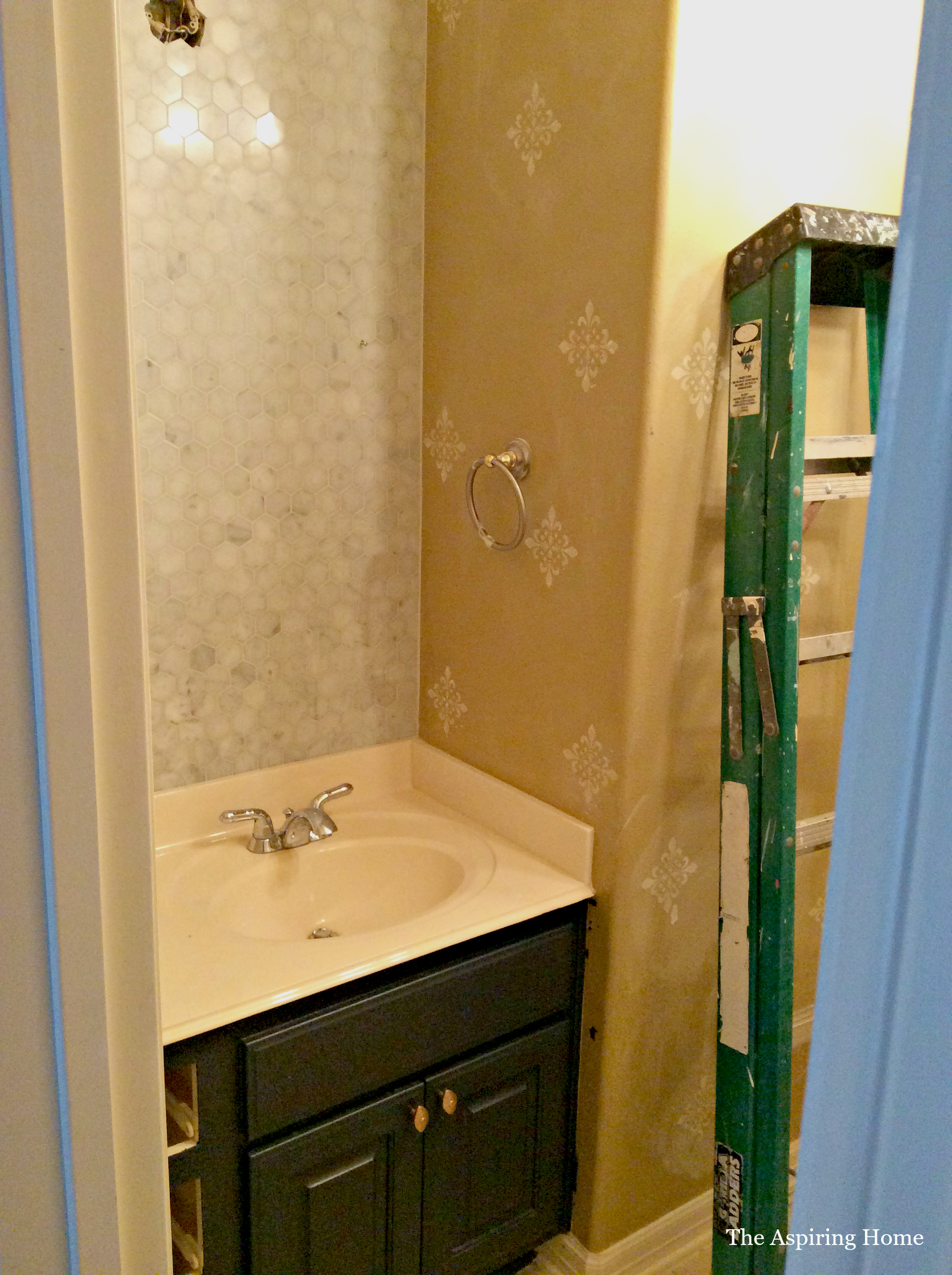 painted vanity and marble tile install