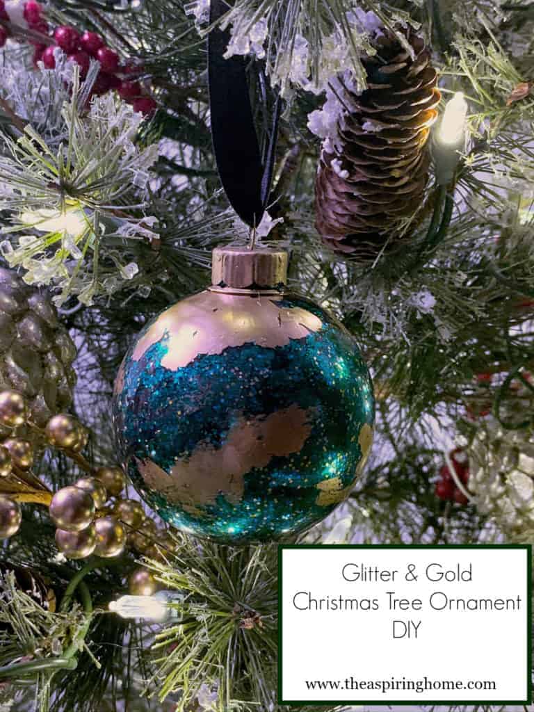 finished glitter and gold Christmas ornament ready to hang on the tree