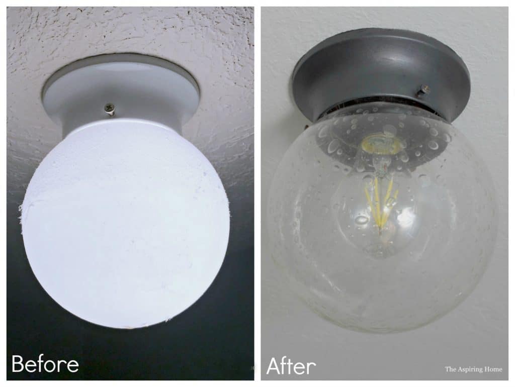 before and after bathroom light fixture update with paint