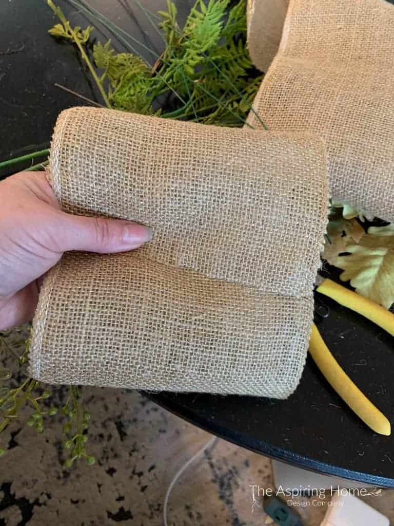 create burlap loops by cutting strips of burlap ribbon and folding in the middle