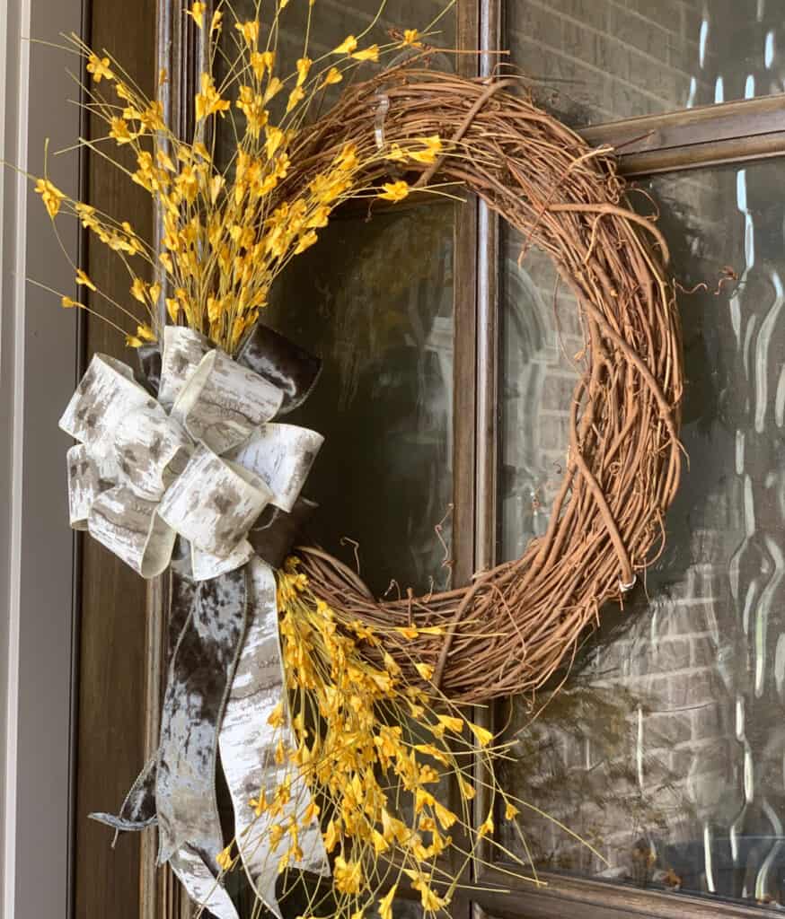Fall DIY projects including this yellow flower grapevine wreath