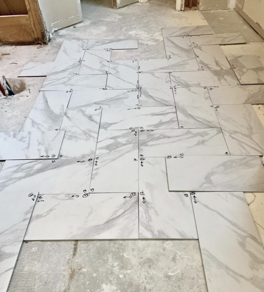 creating pattern with bathroom flooring in primary bathroom