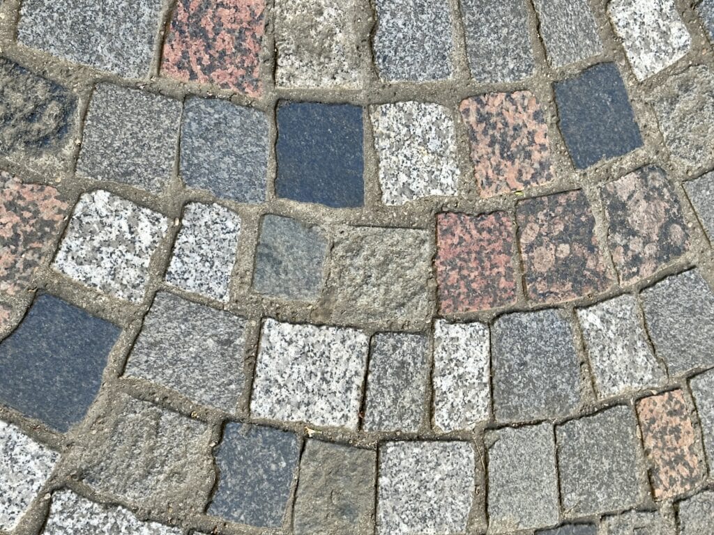 Mosaic fan pattern in roadway